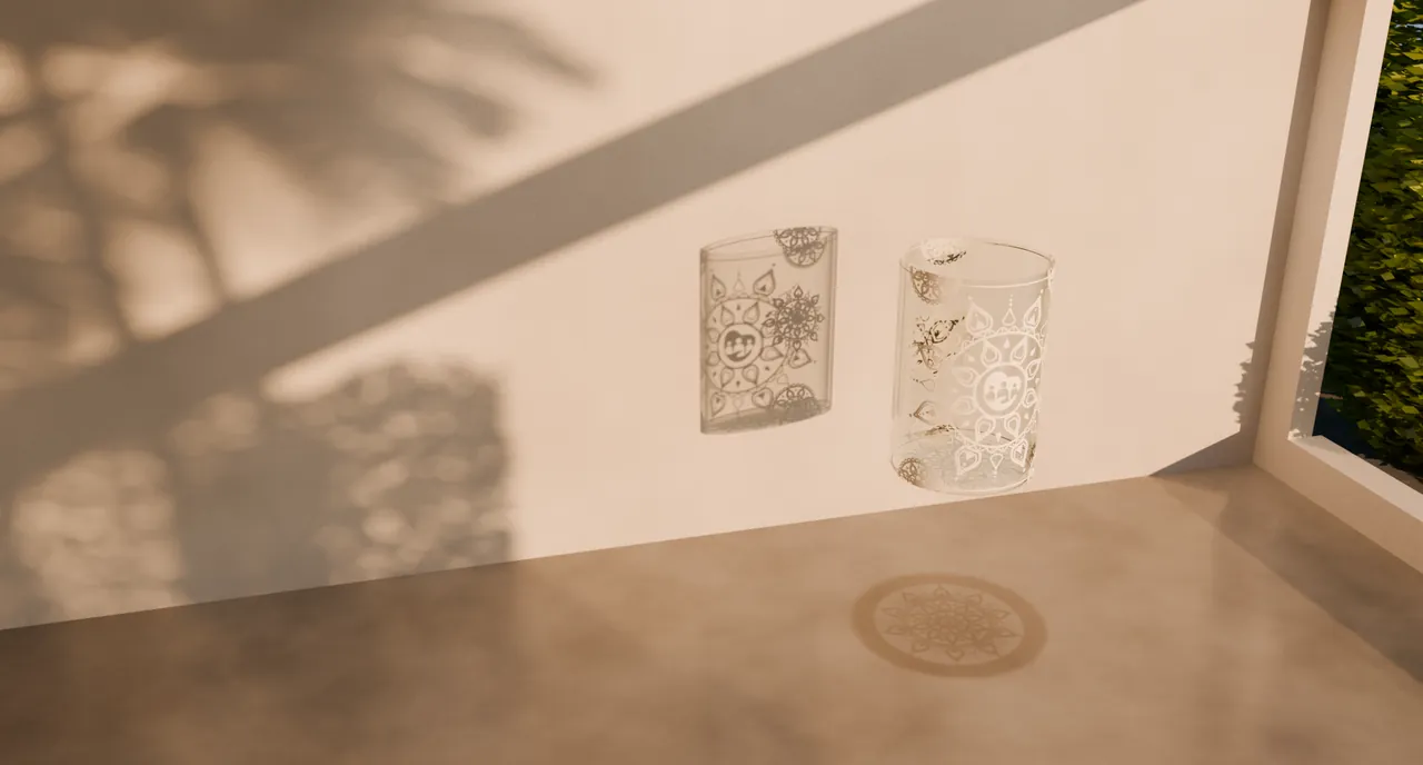 Un vaso de vidrio abierto por arriba, con un mandala pintado en blanco, suspendido en un rincón con luz de tarde: su sombra en la pared es un rectángulo y en el suelo, un círculo, los dos con el mandala dentro.